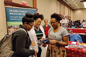 Residents at a recruiting fair